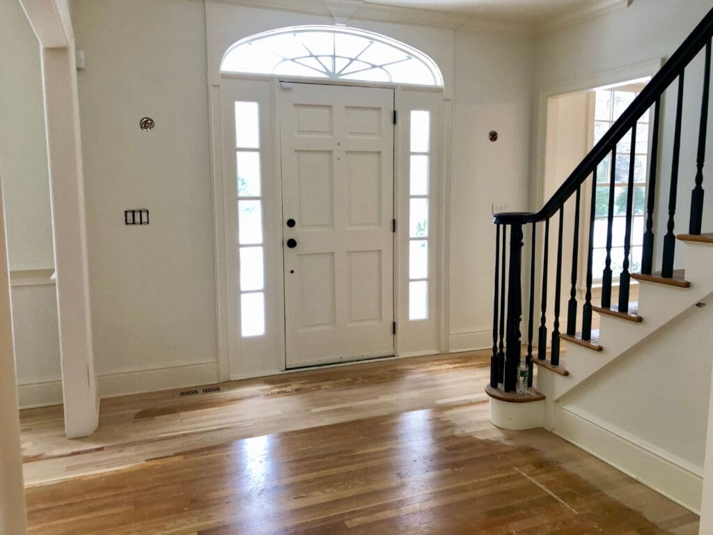hardwood floor before sanding Pelham NY worn finish surface wear entryway wood flooring