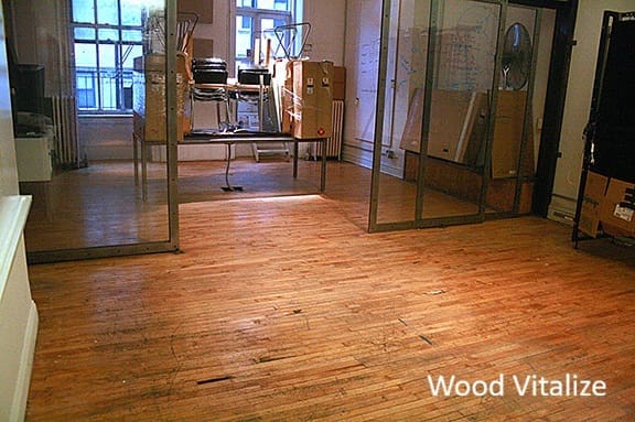 dirty worn commercial hardwood floors office before cleaning plaza district nyc 10022