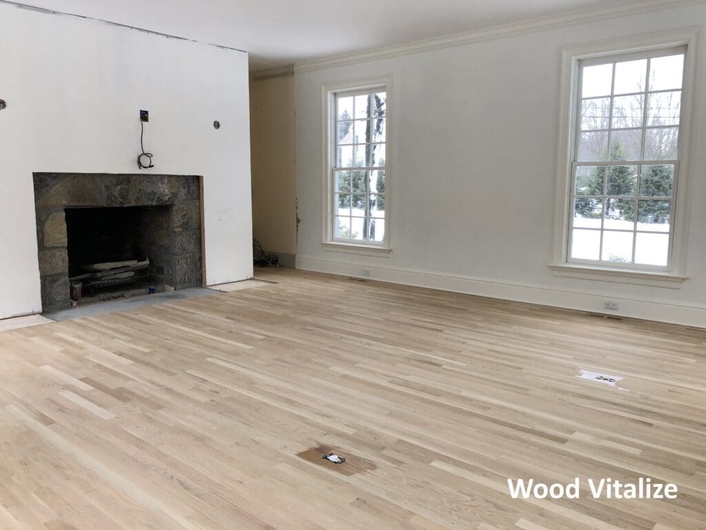 Open living room hardwood floor refinishing in Douglaston Queens NY