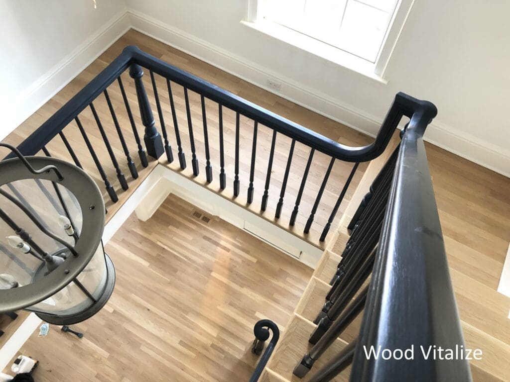Hardwood floor stair landing refinished in Douglaston Queens NY