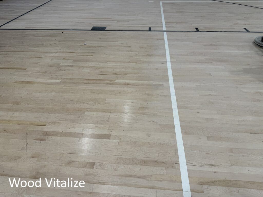 basketball court refinishing nyc before worn hardwood gym floor